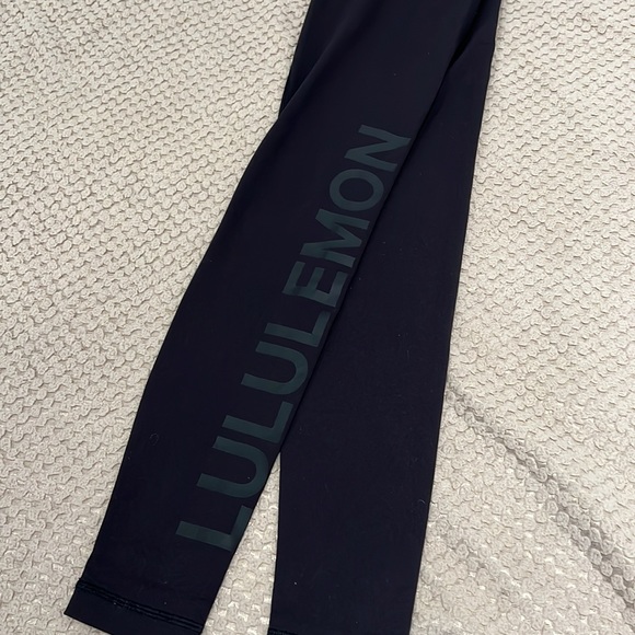 Lululemon High Rise Tight with Block Lettering - Picture 2 of 6